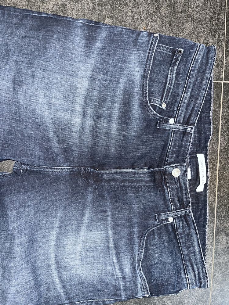Calvin Klein granatowe jeansy r 36/32