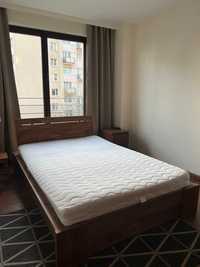 Łóżko drewniane 210x140, kolor dąb + materac sprężynowy