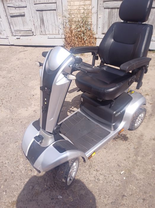 Електро каляска для людей кому тяжко пересуватись