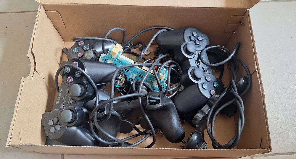 Comandos PlayStation para reparação/peças