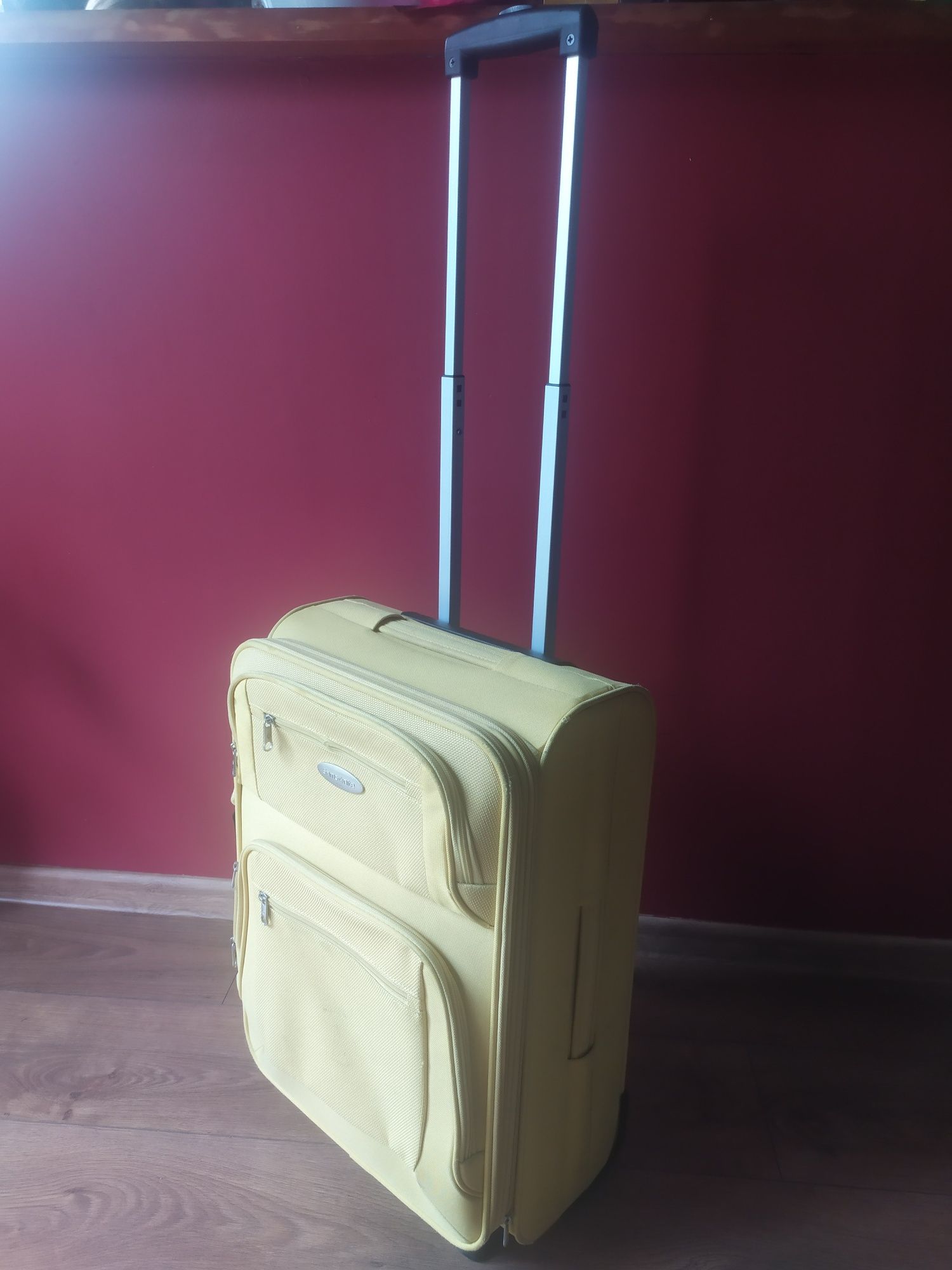 Żółta walizka kabinowa rozszerzana na 2 kółkach Samsonite 54x37x27cm