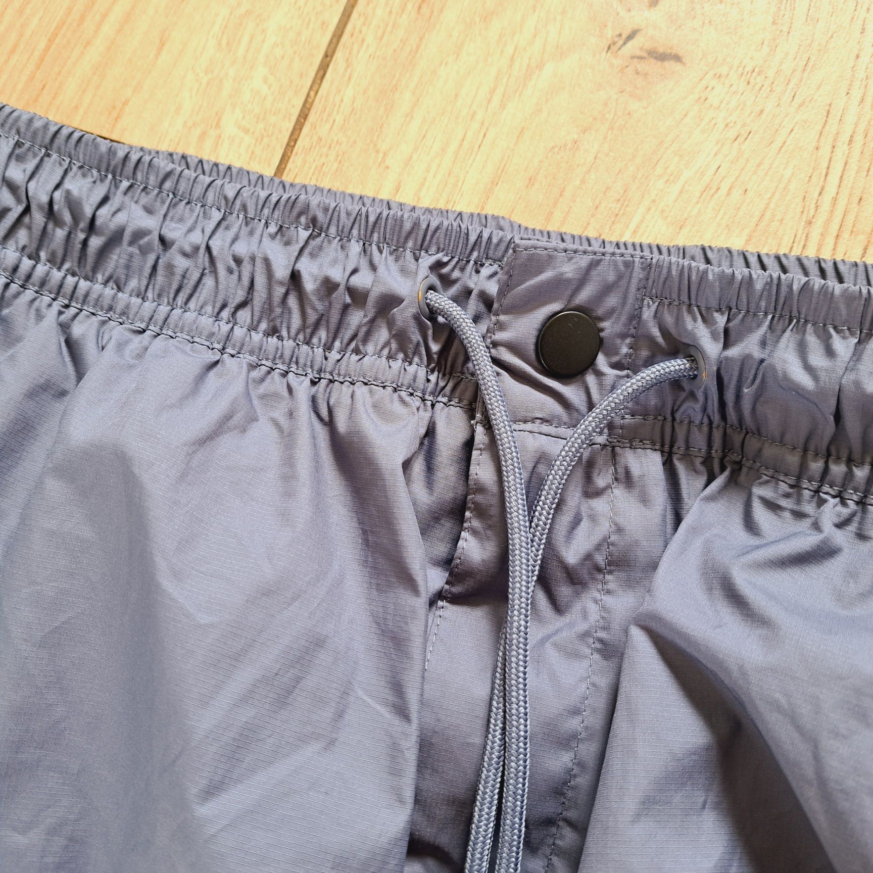 Spodnie Nike Wind running do biegania sportowe