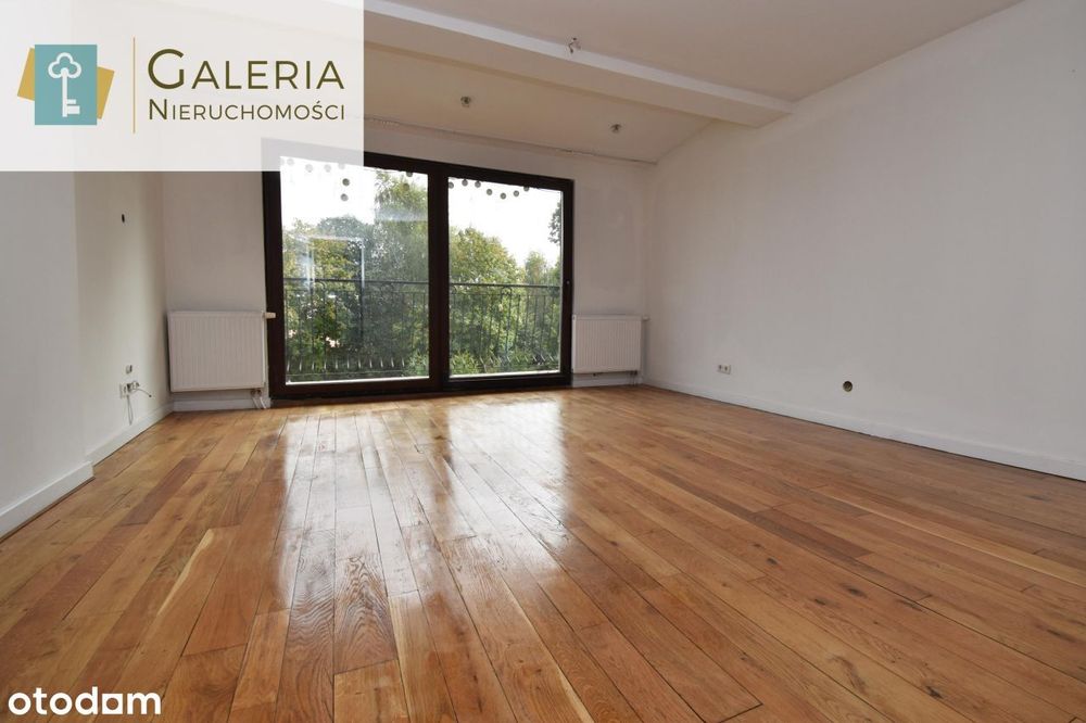 Dwupoziomowe mieszkanie z balkonem i ogrodem