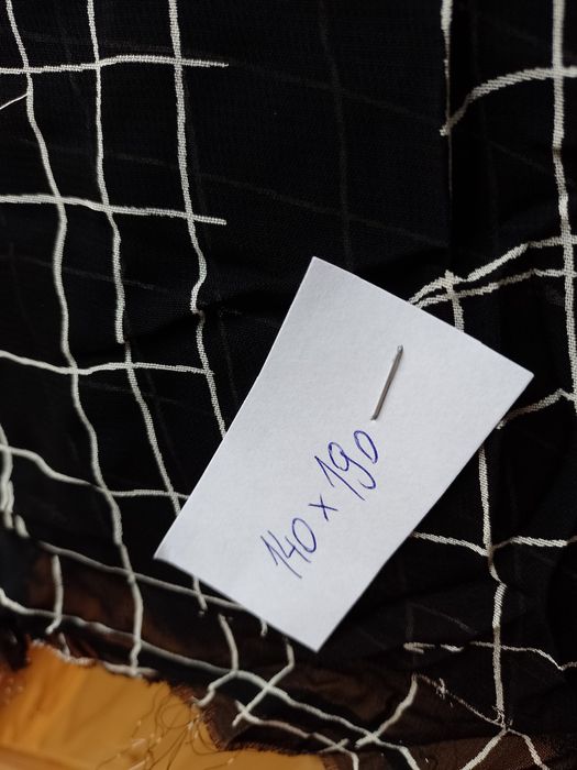 Kawałek materiału. Tkanina. Resztki krawieckie