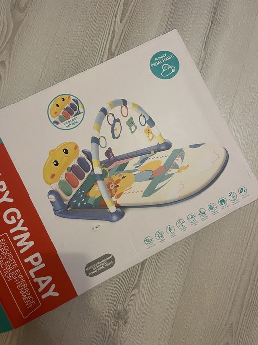 Коврик для немовлят з брязкальцями