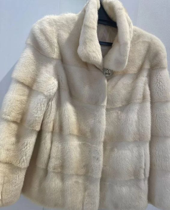 Норкова шуба нова