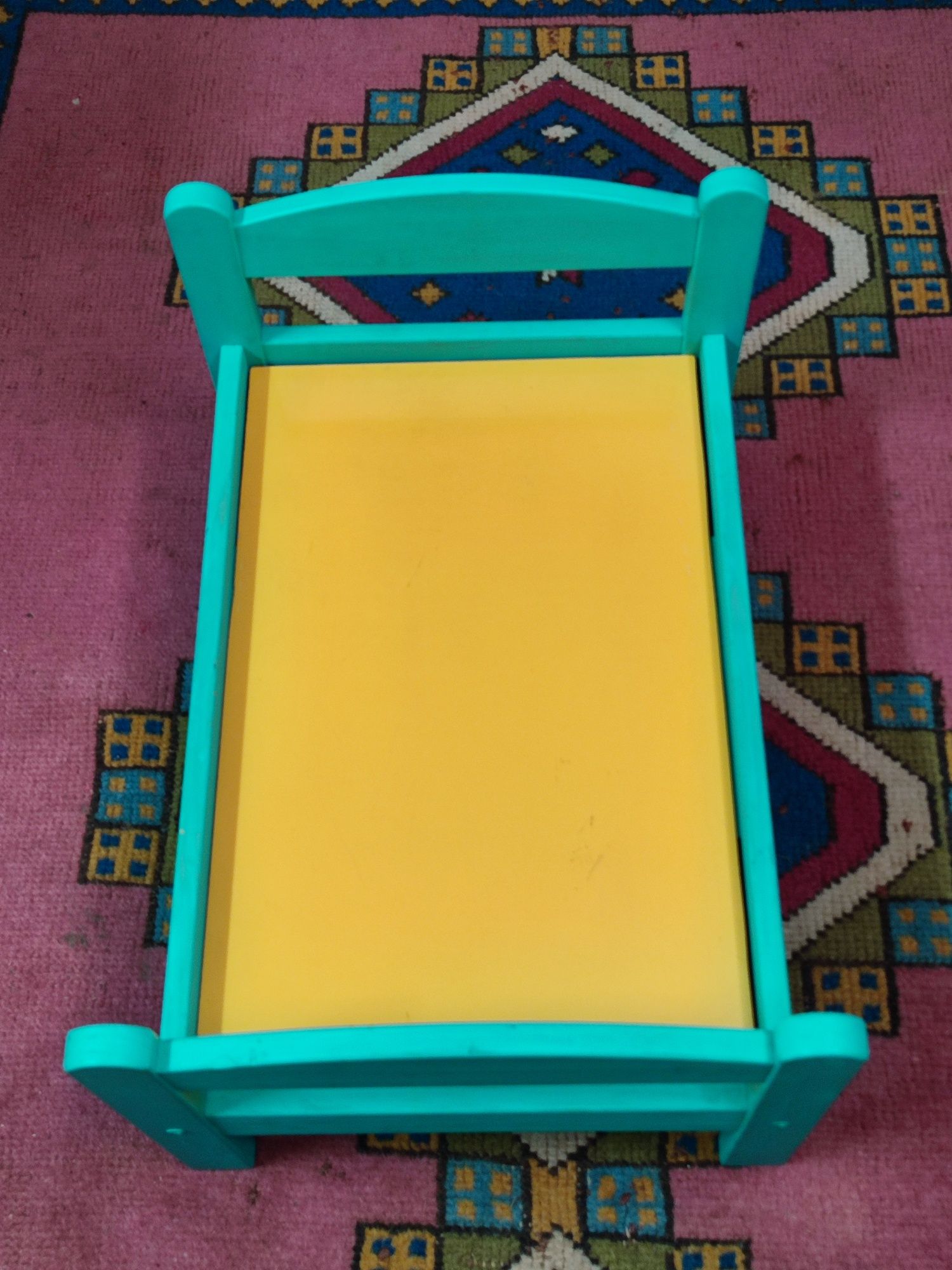 Cama para bonecas