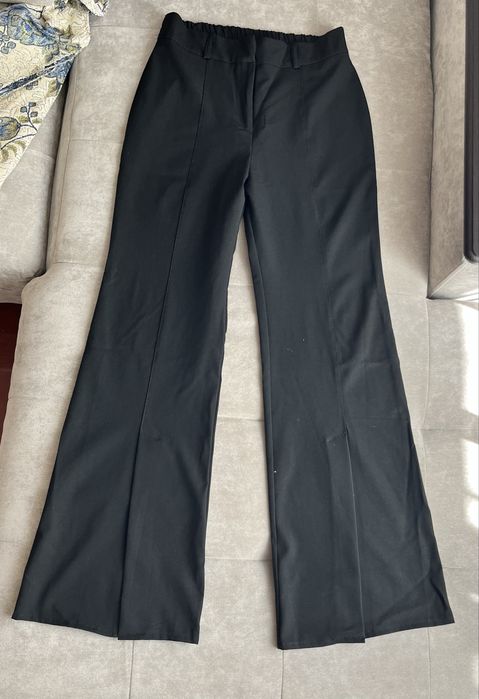 Штани кльош з розпіркою донизу