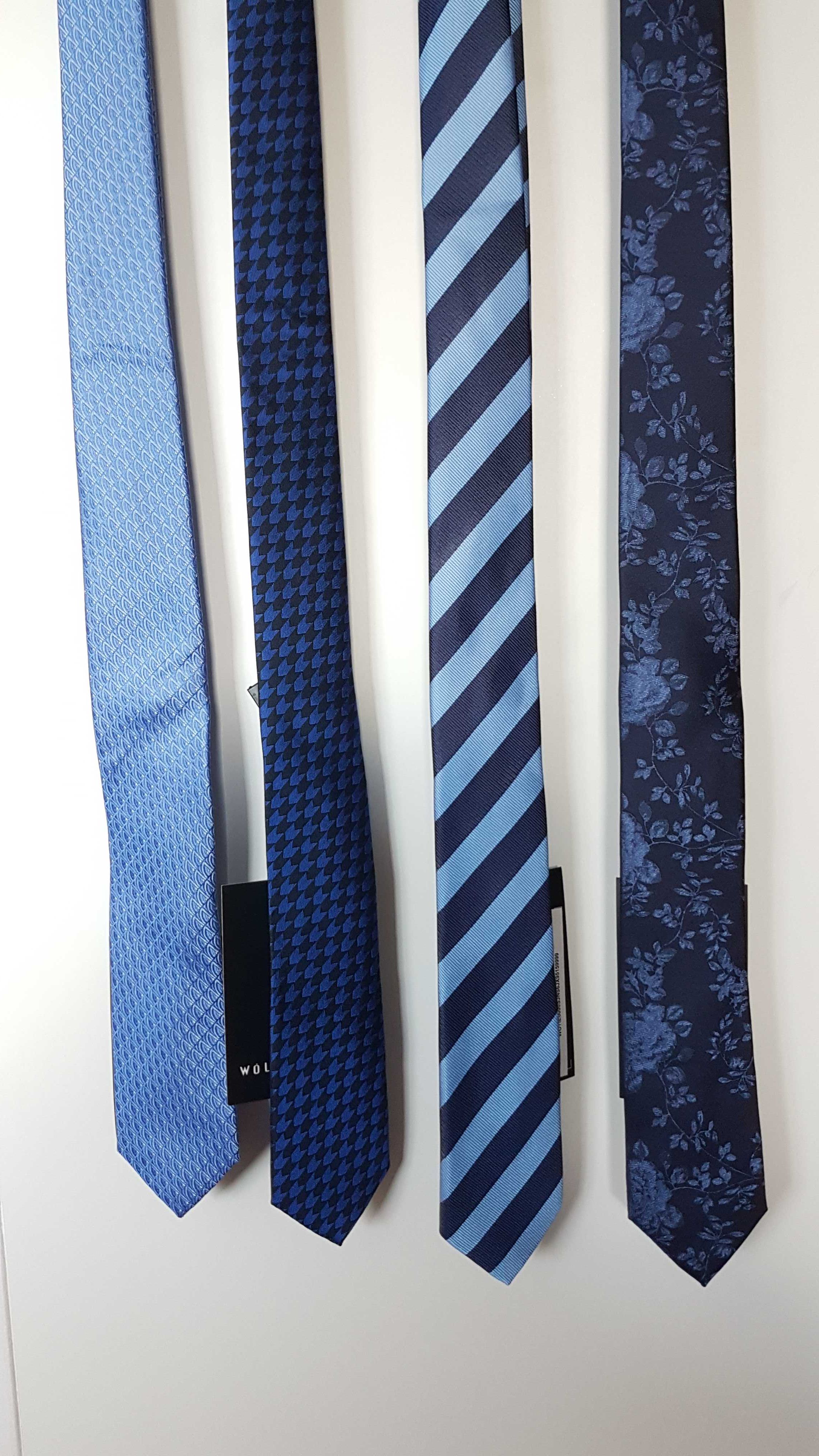 Krawat niebieski/granatowy 100% jedwab Wólczanka różne wzory