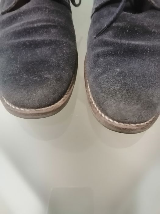 Botas azuis pele, como novas.