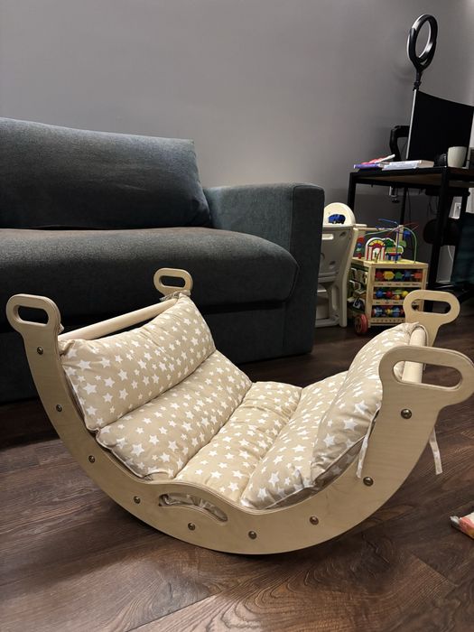 Балансувальна деревʼяна гойдалка