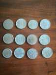 Moedas de 25 e 100 escudos