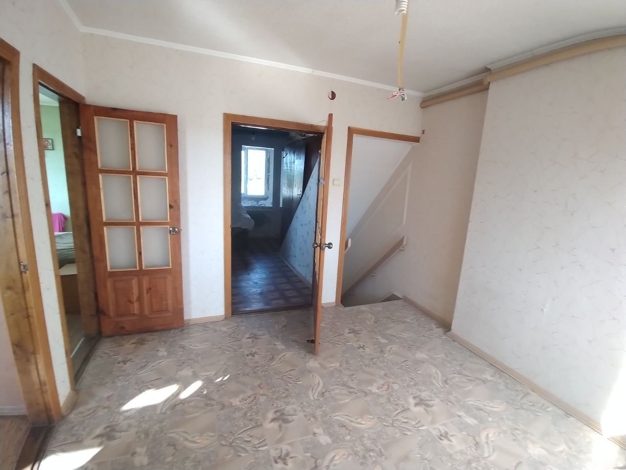 Продам 1/2 будинку, центр м. Дергачі