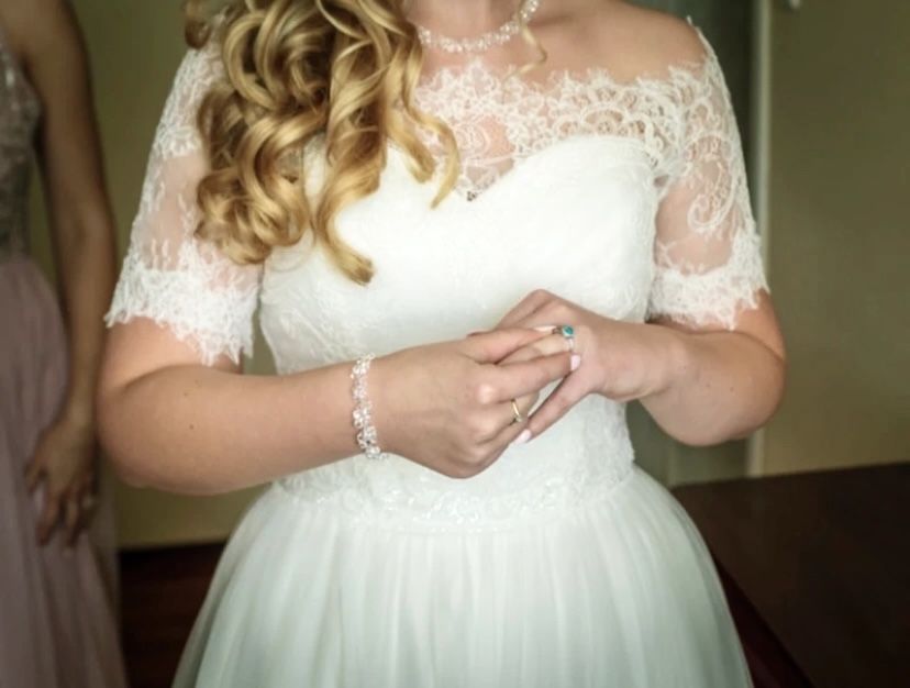 Piękna i romantyczna suknia ślubna Herms Bridal L 40