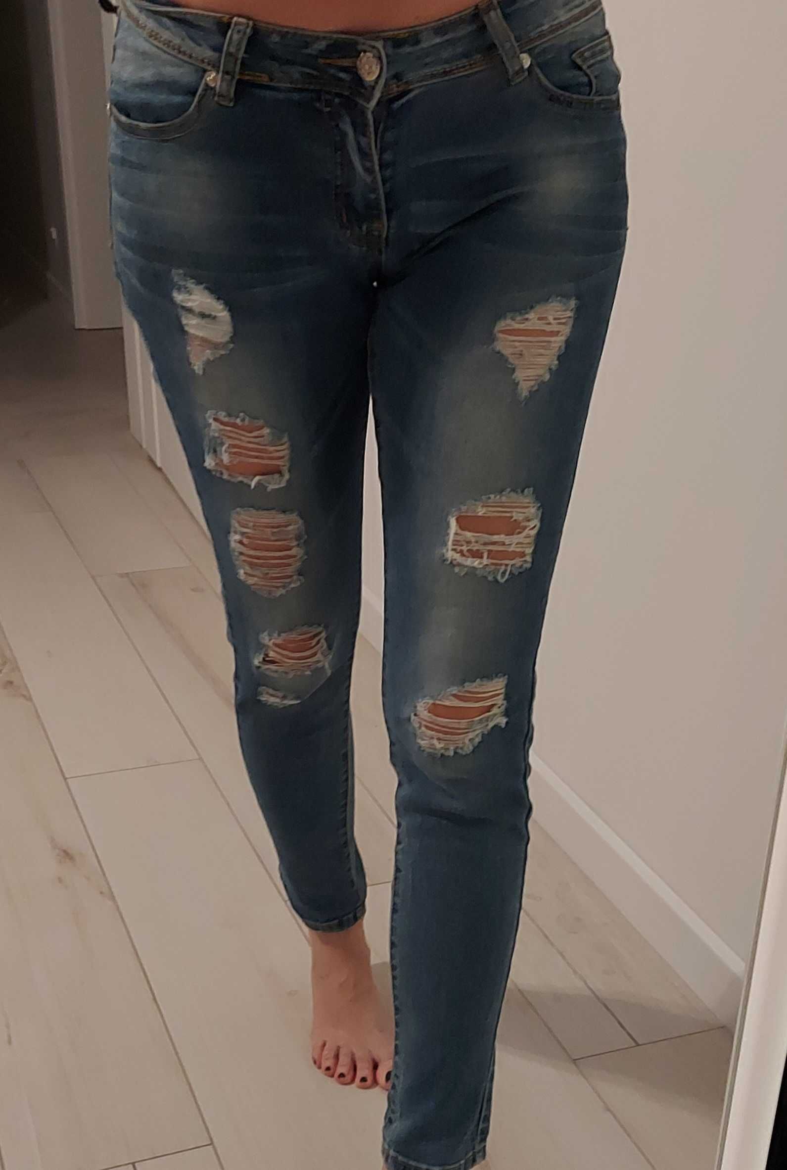 Spodnie jeansowe przedarcia 36