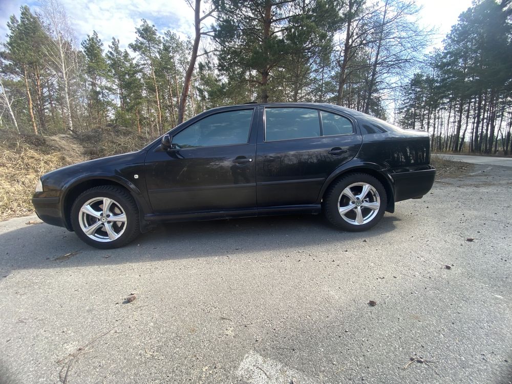Шкода тур 1.8 автомат