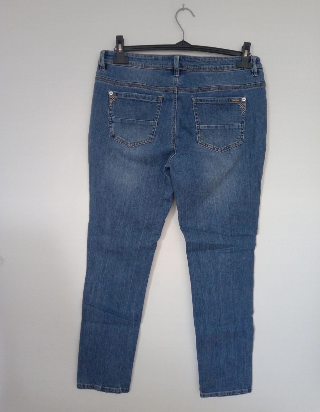 Orsay niebieskie jeansy damskie z rozdarciami rozmiar M