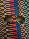 Oculos deeply com bolsa