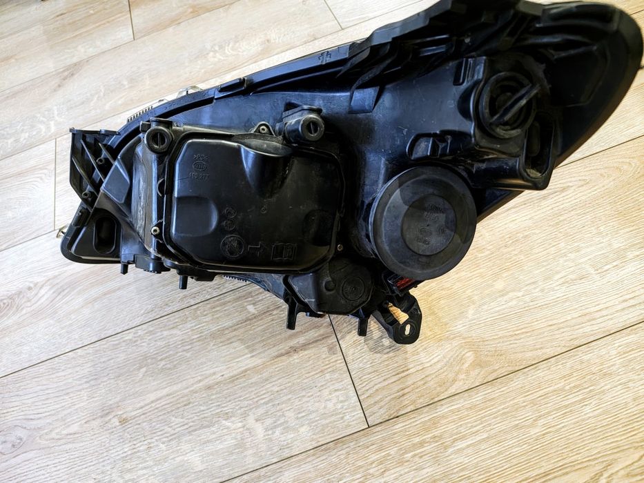 Reflektor lampa przód prawa opel astra h 3 III bixenon skrętny eu