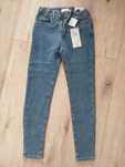Spodnie Reserved r.140