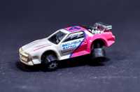 Samochodzik # 1986 Matchbox BURNIN KEY CARS Racing Blaster Pink/White