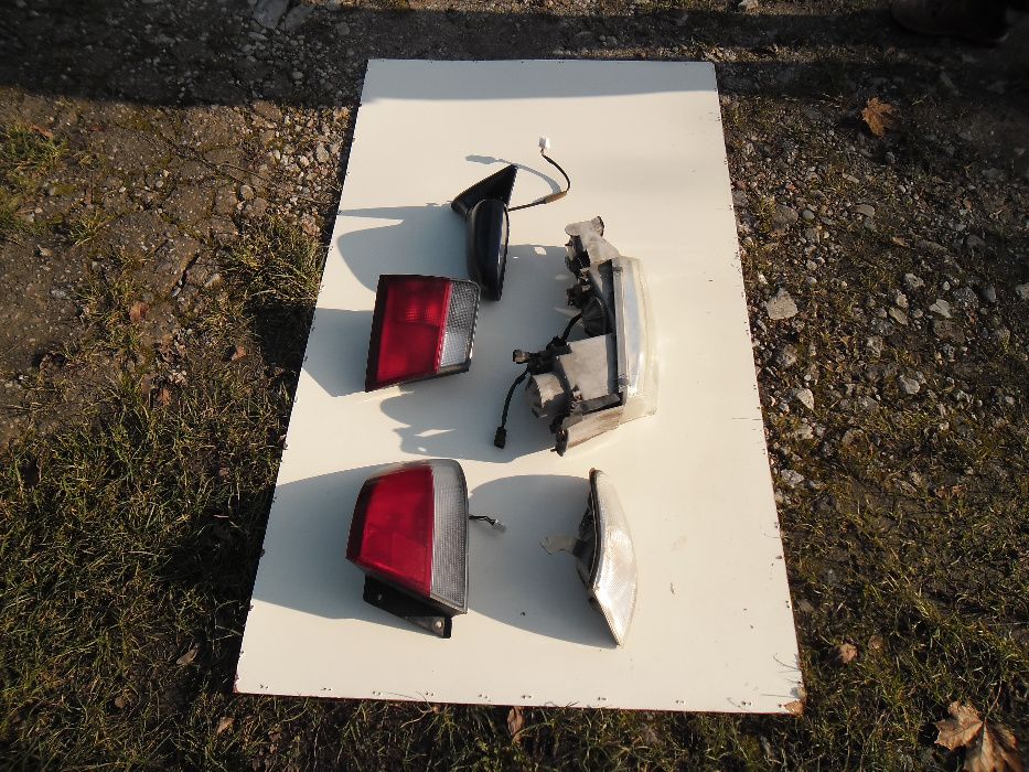 Lampy tylne komplet Mazda 626 sedan '96