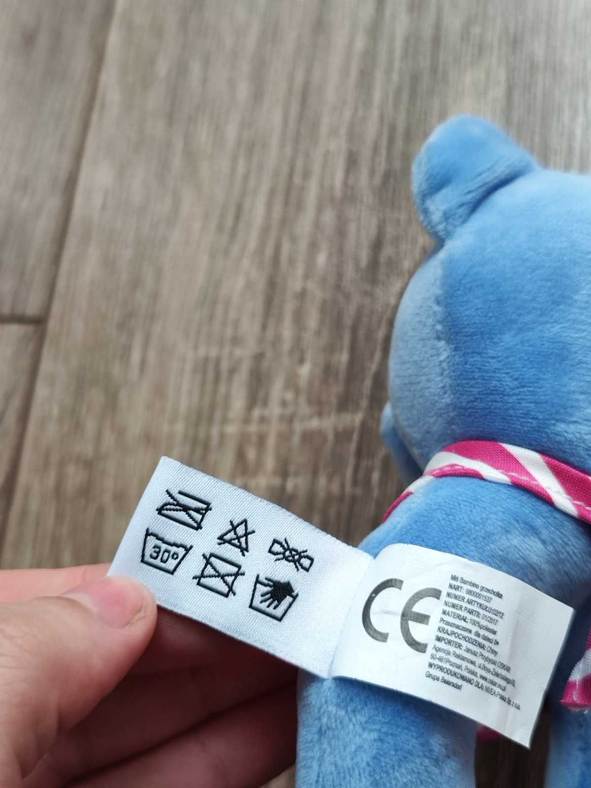 Niebieski miś Bambino grzechotka Nivea zabawka pluszak maskotka