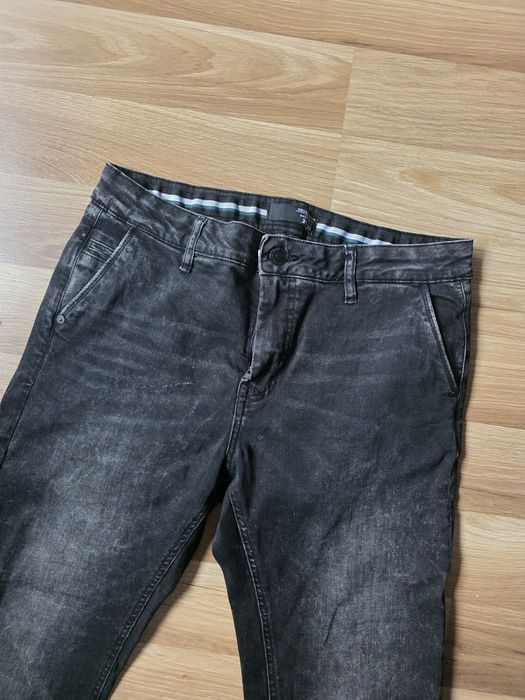 Męskie spodnie denim house 31/32