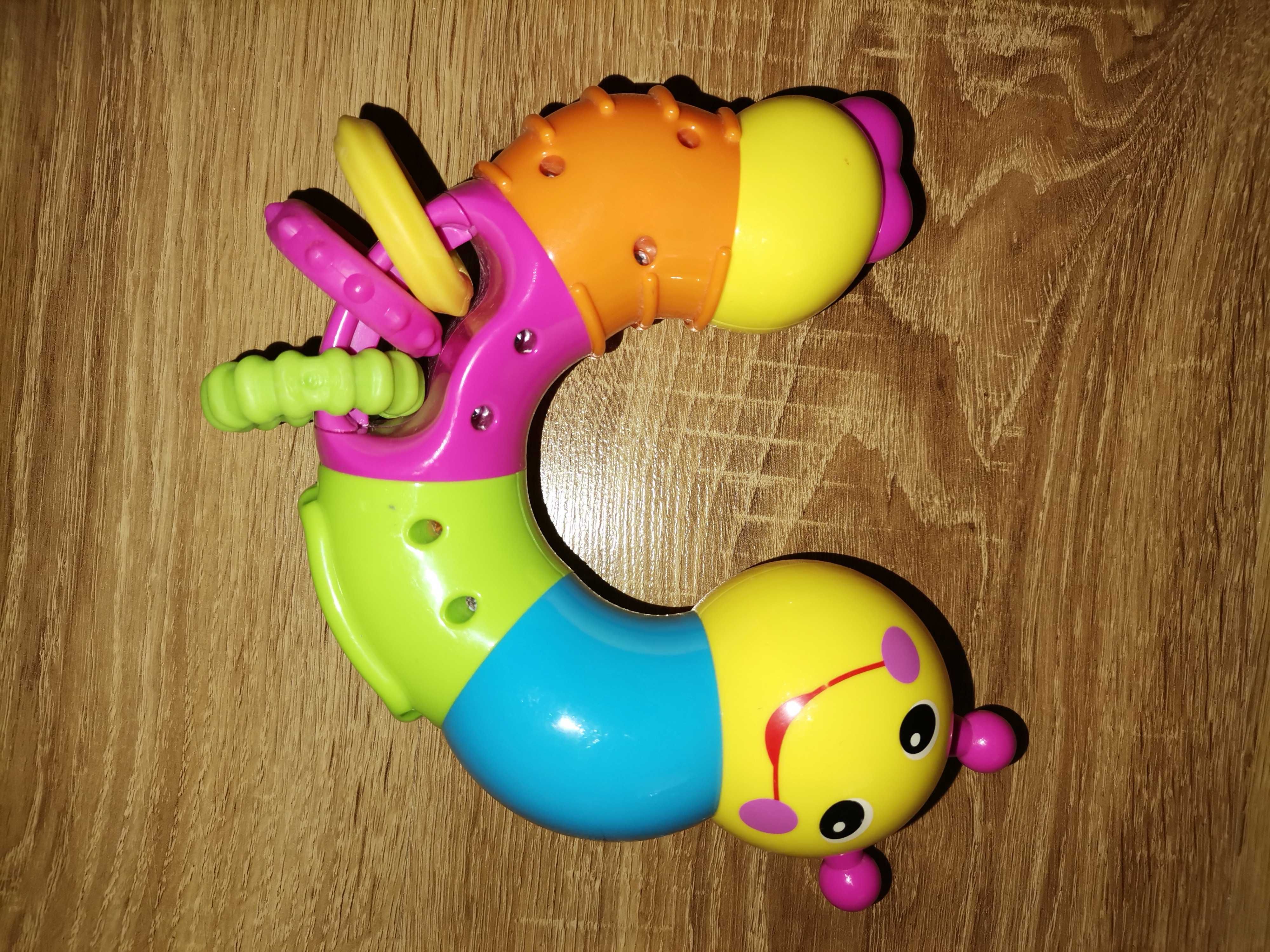 Дитяча іграшка -  розвиваюча багатофункціональна гусениця-тріскачка