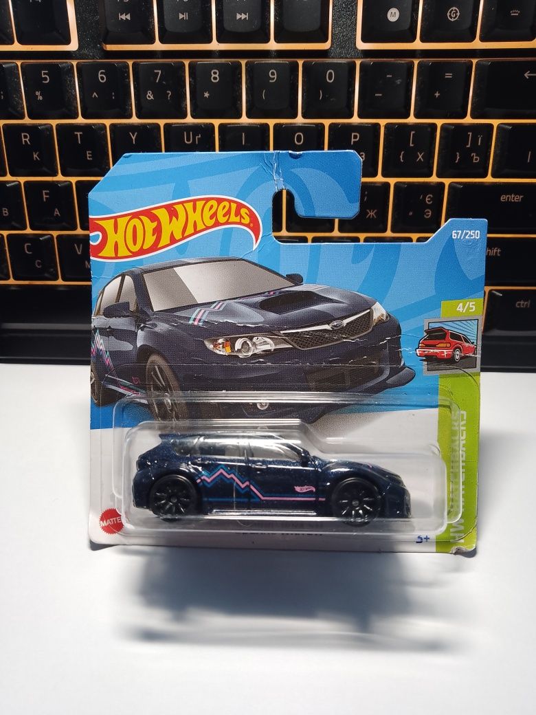 Hot wheels Toyota van 1986, Subaru WRX STI.