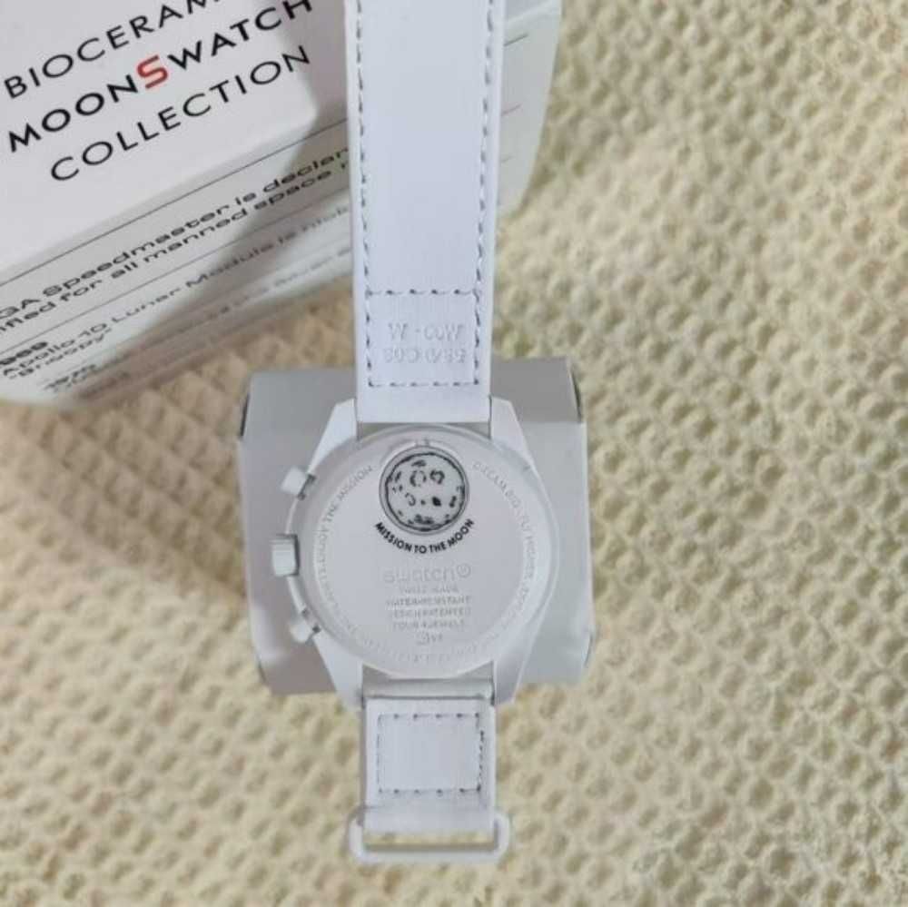 Omega x Swatch Snoopy SO33W700 - Ekskluzywny Box Limitowany