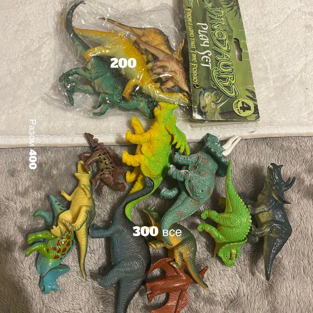 Іграшки для хлопчика роботи динозаври фонарик