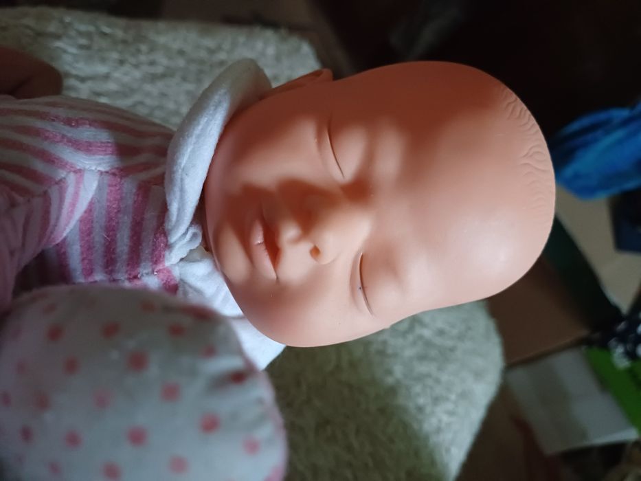 Сплячий музичний пупс