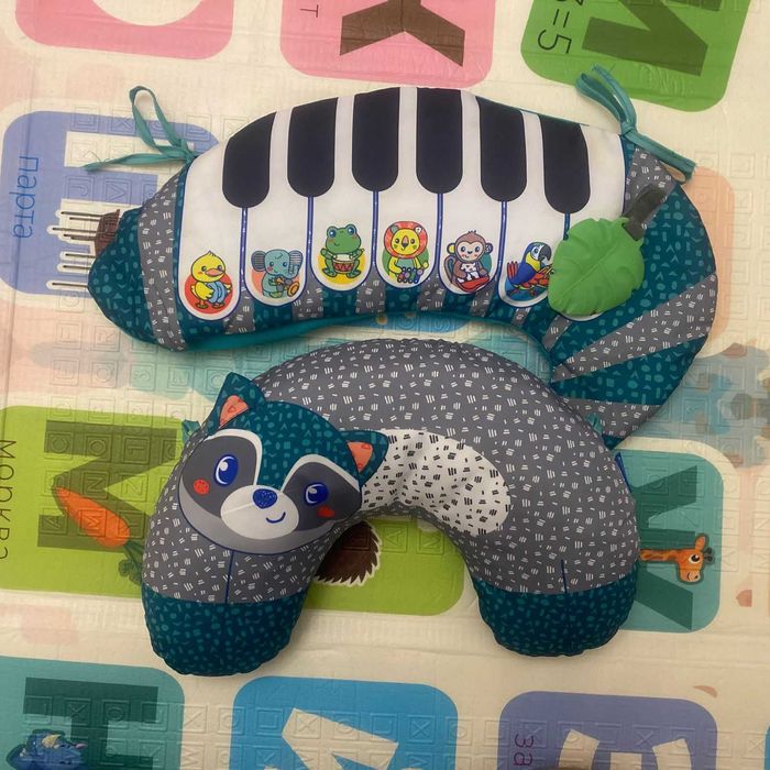 Розвиваюча іграшка Infantino Подушка-рояль Єнот