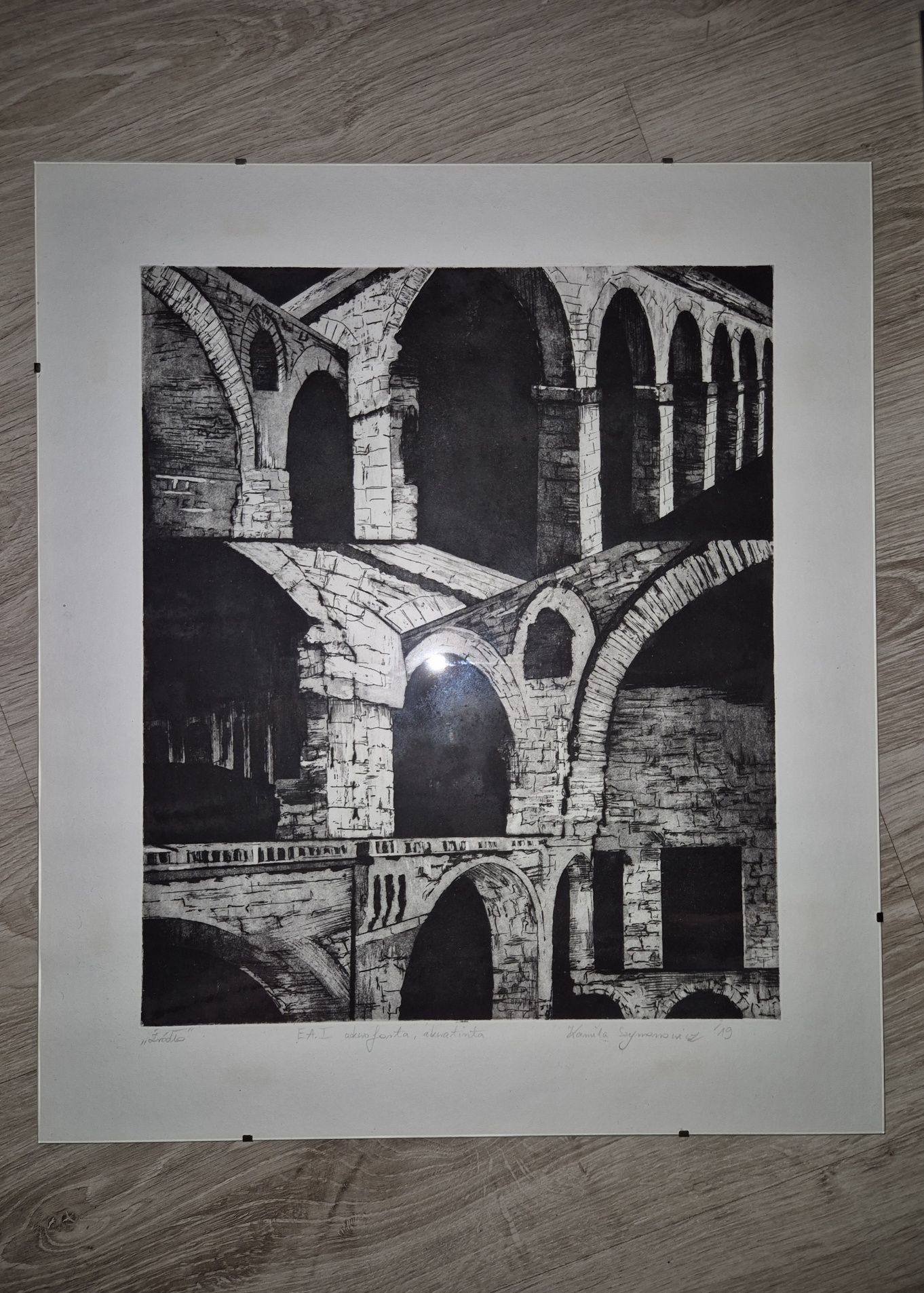 Grafika w antyramie architektura akwaforta akwatinta