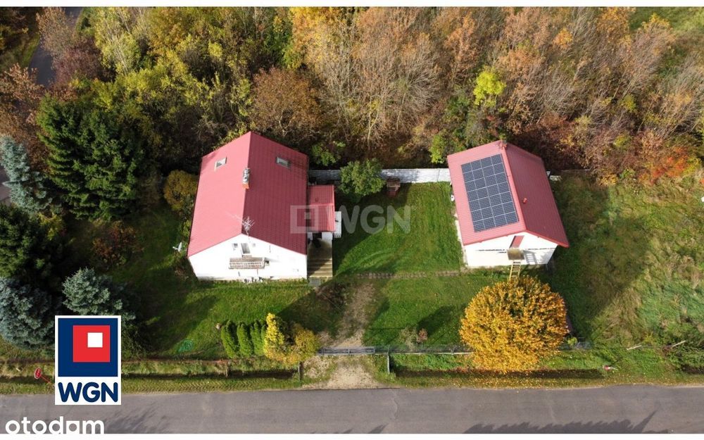 Dom z budynkiem gospodarczym w cichej okolicy
