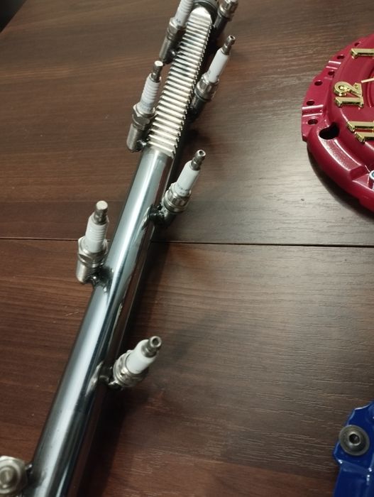 Wieszak handmade z listwy i świec zapłonowy