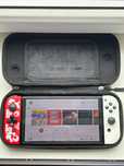 Nintendo Switch OLED + 3 Gry + Case + 256 GB SD