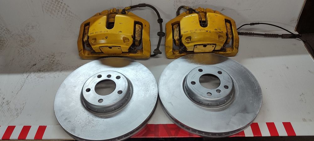 Tarcze hamulcowe przód Zaciski zacisk lewy prawy  BMW f01 f02 4.4i 374