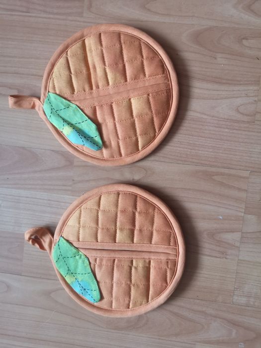 Za dwie łapki do gorących naczyń.