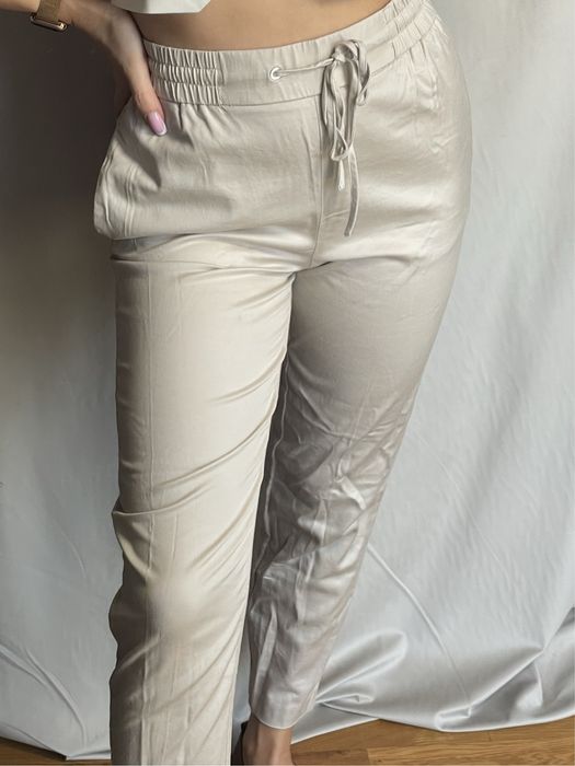 Spodnie klasyczne beżowe chinosy proste z wysokim stanem