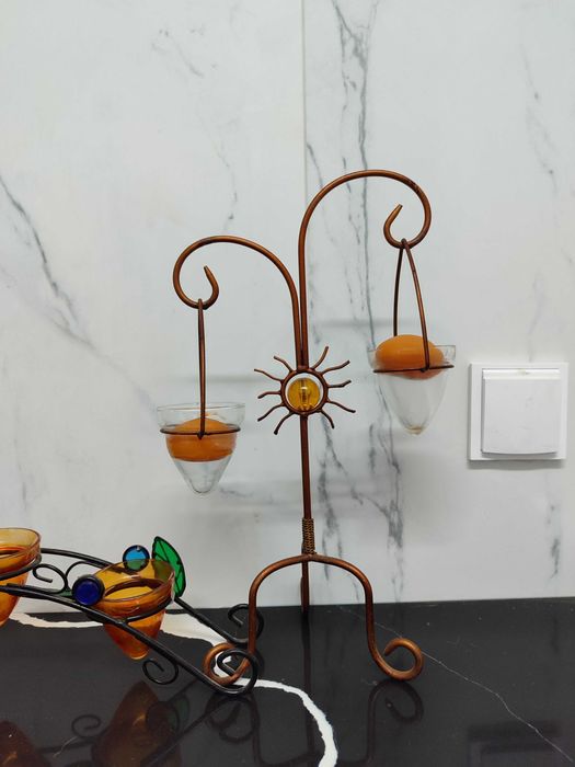 4 castiçais/porta velas