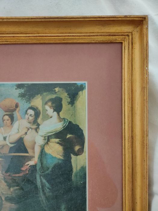 Moldura com cópia de pintura de Murillo.