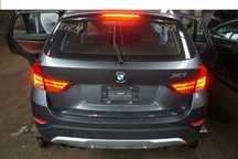Tampa da mala farolim para choques BMW X1 E84