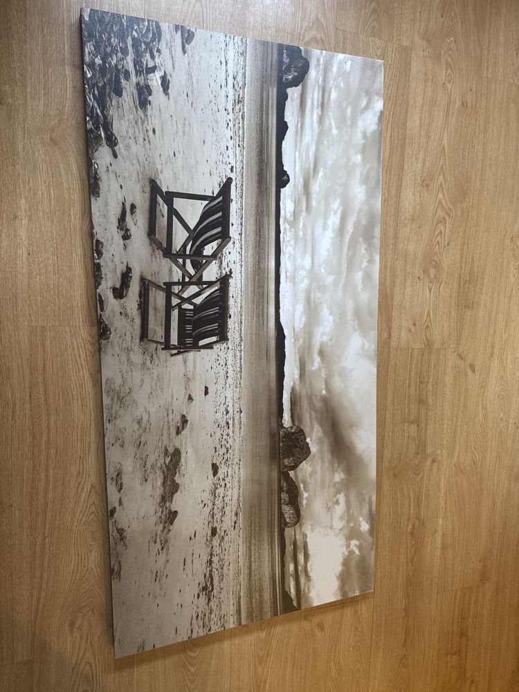 Quadro de praia com cadeira