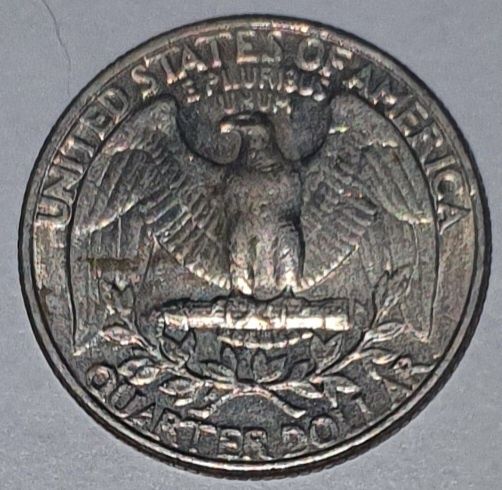 Moneta 25 cent 1985 P. (USA).