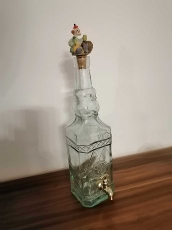 Garrafa de vidro com torneira