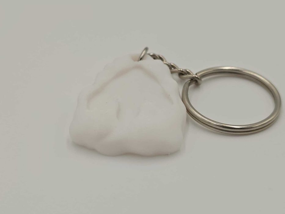 Ślad Giganta — breloczek skamieniałe odbicie stopy T-rex - Druk 3D