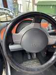Smart ano 2004 em bom estado pneus bons capota funcionando