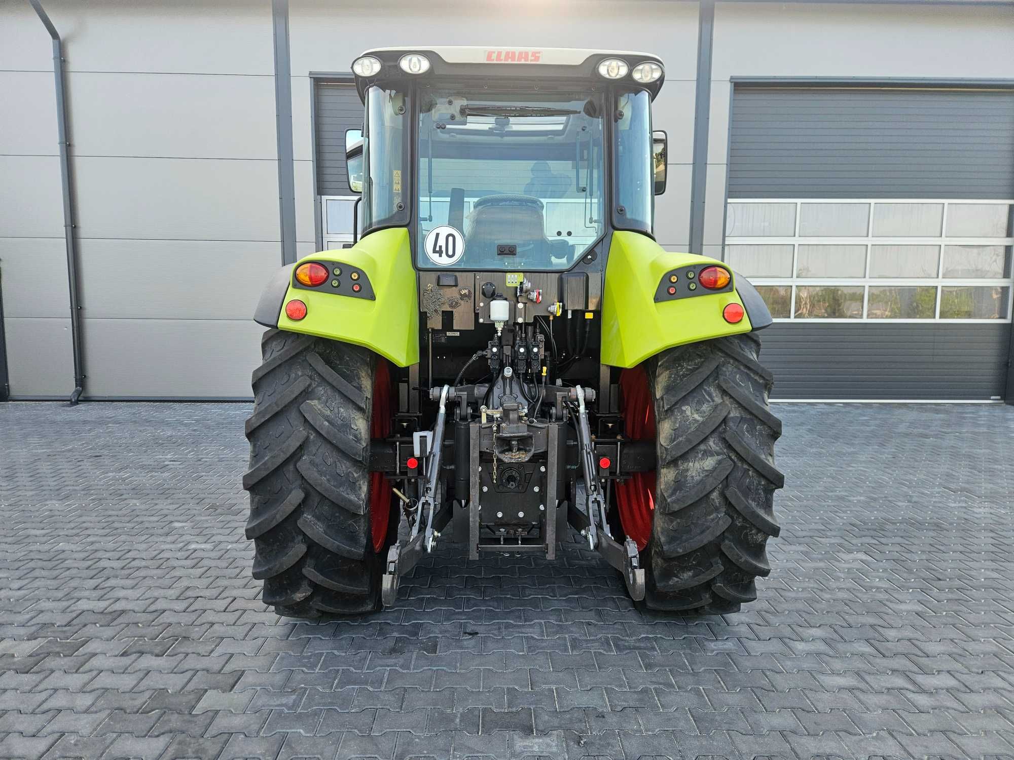 Claas Arion 410 Axos